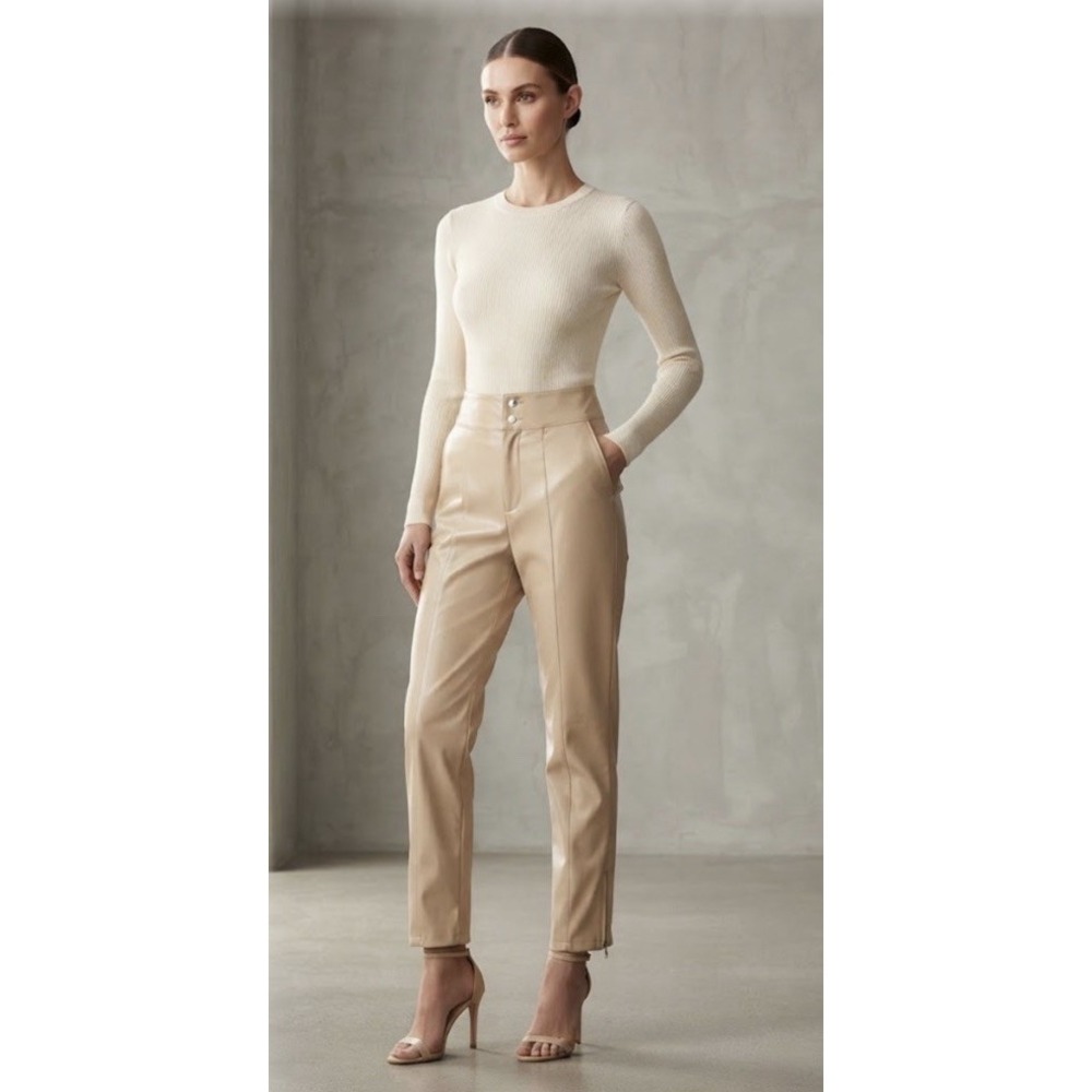 pants are made from a smooth faux leather material NEW SIZE M